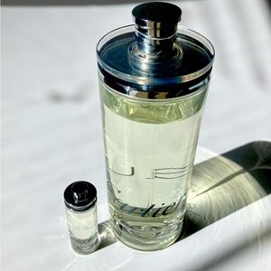 Cartier 6.75 fl. Oz and Cartier mini perfume .16 fl. Oz